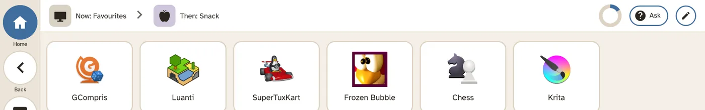 The person's Games and apps: big tiles with each game's own picture: GCompris, Luanti, SuperTuxKart, Frozen Bubble, Chess, Krita.