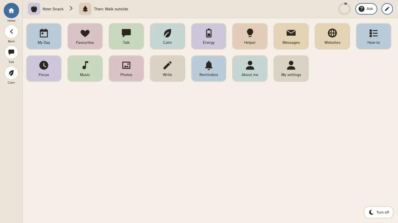 Home with smaller tiles: My Day, Favourites, Talk, Calm, Energy, Helper, Messages, Websites, How-to, Focus, Music, Photos, Write, Reminders, About me, My settings.